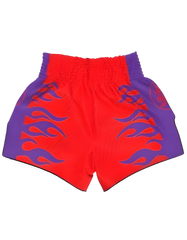 Red embroidered Flaming Oni Thai shorts by Sabai Fightwear featuring traditional Thai design and vibrant fabric details.